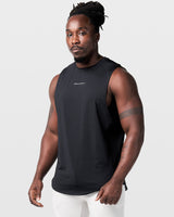 Limitless Men’s Cut Sleeve in black, left side profile with split hem and wide shoulders for comfort and movement.