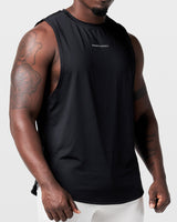 Detailed shot of center chest branding on Limitless black gym tank for men.