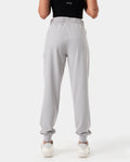 Back view of women’s Breathe Joggers in light grey, showcasing a tapered design and thick waistband for a secure fit.