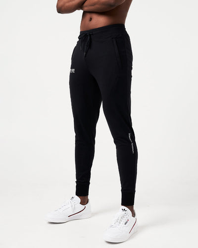 Lightweight black men’s joggers with sweat-wicking fabric, a relaxed fit, and performance-enhancing features.