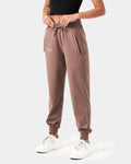 Women’s lightweight joggers in brown, side profile showcasing moisture-wicking fabric, thick waistband, and ergonomic fit for comfort.