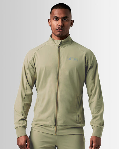Light green jacket with a brand logo on a white background