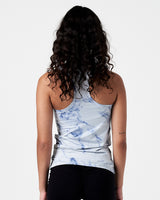 Back view of women’s LYFTLYFE blue marble tank showing racer cut and stretch fabric.