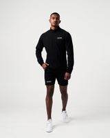 Black men’s activewear shorts with moisture-wicking fabric and ergonomic squat-proof design.