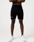 Front view of men’s black Breathe Shorts featuring a minimalist reflective Lyftlyfe logo and adjustable tonal drawstring.