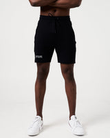 Front view of men’s black Breathe Shorts featuring a minimalist reflective Lyftlyfe logo and adjustable tonal drawstring.