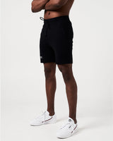 Men’s performance shorts in black, side profile highlighting lightweight breathable fabric and adjustable drawstring waistband.