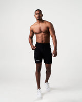 Men’s black Breathe Shorts featuring a minimalist reflective Lyftlyfe logo, wide waistband, and adjustable tonal drawstring.