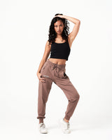 Women’s Breathe Joggers in brown with a thick waistband and 4-way stretch fabric for unrestricted movement.