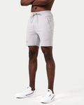 Light grey Breathe Shorts for men, shown from the side, with a comfortable fit and secure zippered pockets.
