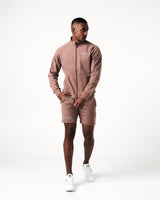 Men’s Breathe Shorts in brown, designed for comfort and performance with a sleek fit and breathable fabric.