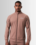 Men’s brown Breathe Zip-Up Jacket featuring a reflective Lyftlyfe logo on the left chest and a sleek, athletic fit.