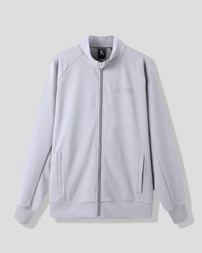 Light gray jacket with a brand logo on a light gray background