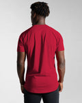 Back view of the Contour Men’s T-Shirt in red, showing its fitted cut, wrinkle-resistant fabric, and smooth stitching details.