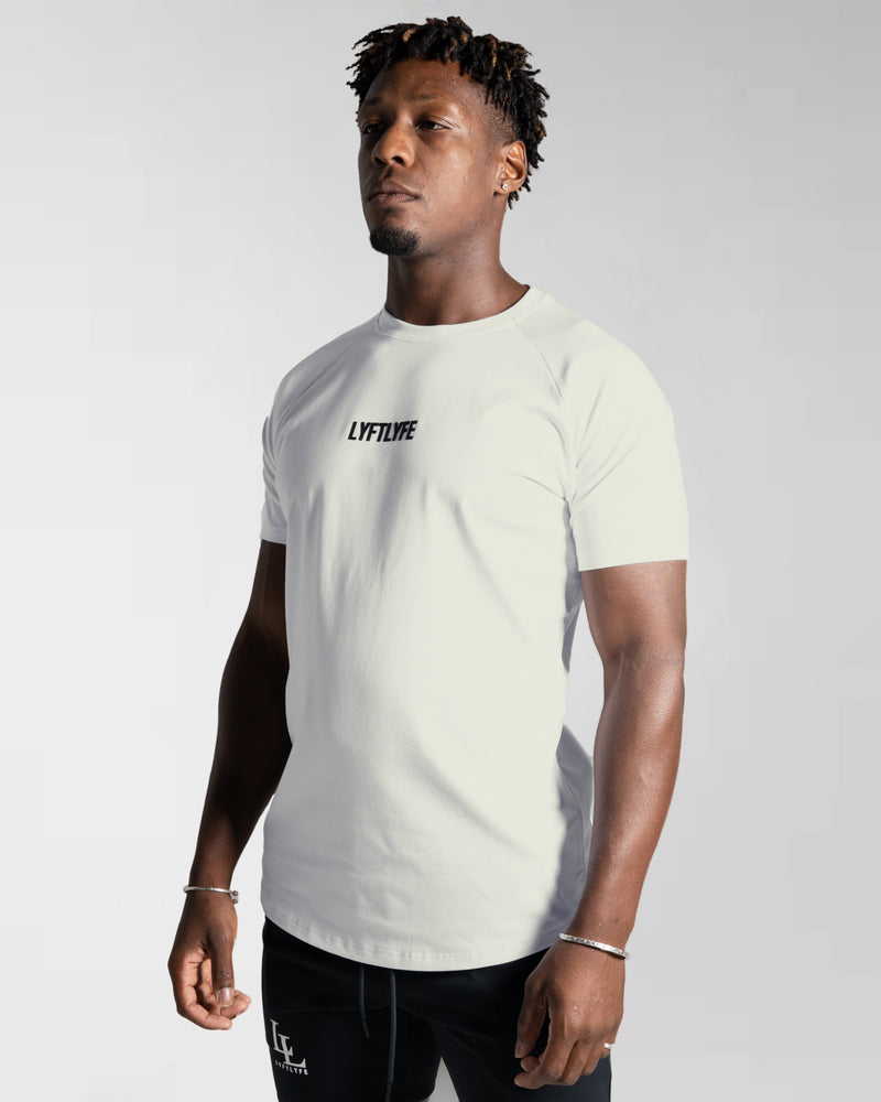 Men’s Contour T-Shirt in off-white, crafted with moisture-wicking fabric and a fitted cut for everyday movement.