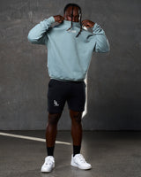 Men’s ultra-soft light blue crewneck sweater with oversized fit, cotton-polyester blend, and bold 3D Lyftlyfe branding.