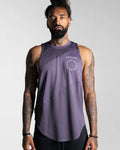 Men’s sleeveless tank in purple, featuring a scoop hem, performance stretch fabric and a white LYFTLYFE logo.