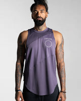 Men’s sleeveless tank in purple, featuring a scoop hem, performance stretch fabric and a white LYFTLYFE logo.