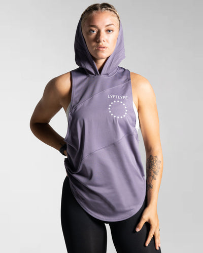Women’s Dominance Sleeveless Hoodie in purple, designed with a lightweight hood and breathable stretch panels.