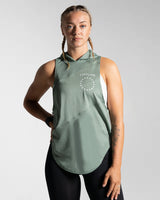 Women’s Dominance Sleeveless Hoodie in green, featuring a lightweight hood and breathable performance fabric.