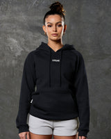 Women's black full-length hoodie with center LYFTLYFE logo and drawstrings.