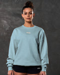Women’s fleece crewneck in light blue with ribbed hems, a clean oversized design, and bold 3D Lyftlyfe branding on the chest.