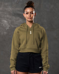 Front view of women’s cropped hoodie in pine green with 3D Lyftlyfe logo and tonal drawstrings.