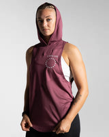 Left side view of Women’s Dominance Hoodie in prune, highlighting a scoop hem, soft stretch fabric, and ergonomic fit.