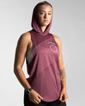 Right side view of Women’s Dominance Hoodie in prune, highlighting a scoop hem, soft stretch fabric, and ergonomic fit.