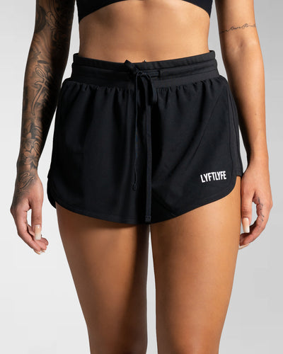 Performance-focused high-rise black shorts with 3D logo and stretch waistband.