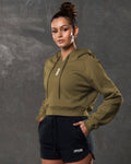 Left side profile of Elite cropped hoodie in green showing relaxed fit and ribbed hem.