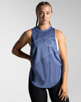 Women’s Dominance Cut Sleeve tank top in blue, featuring lightweight tri-blend fabric with antibacterial and anti-odor technology.