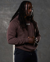 Right side profile of brown LYFTLYFE hoodie showing sleeve fit and minimal branding.