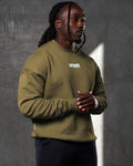 Right Side view of men’s Adapt Crew in green with relaxed fit, ribbed detailing, and lightweight fleece material for all-day wear.