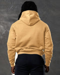 Elite men's hoodie in yellow, back detail with plush finish and dropped shoulder design.