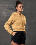 Right side profile of Elite cropped hoodie in yellow, showing relaxed fit and ribbed hem.