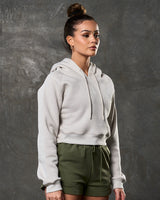 Sand cropped fleece hoodie right side angle highlighting sleek athletic cut.