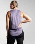 Back view of Women’s Dominance Cut Sleeve in purple, showcasing wrinkle-resistant, lightweight fabric for gym wear.