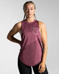Women’s Dominance sleeveless tank in prune, crafted with breathable jersey mesh and stretch material for unrestricted movement.