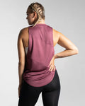 Back view of Women’s Dominance sleeveless tank in prune, crafted with breathable jersey mesh and stretch material for unrestricted movement.