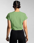 Back view of the Women’s Drill Crop Tee in green, offering cooling properties, premium stitching, and all-day comfort.