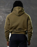 Rear angle of LYFTLYFE Elite hoodie in green showing fitted hem and relaxed hood.
