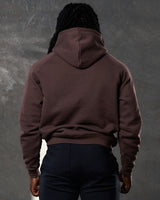 Back view of brown men's hoodie with hood up and no visible branding.