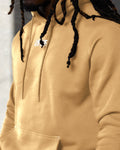 Close-up of LYFTLYFE logo on chest and tonal drawstrings of yellow hoodie.