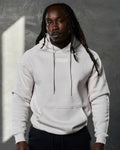 Front shot of men's Elite hoodie in white sand, featuring plush fleece and tonal drawstrings.