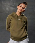 Zoomed-in front view of cropped women’s hoodie in green highlighting logo and stitching.