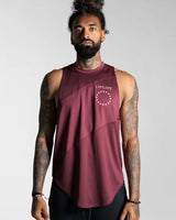 Men’s sleeveless gym tank in dark wine color, designed with wide arm openings and moisture-wicking fabric for breathability.