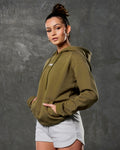 LYFTLYFE women’s pine green hoodie with pocket detail from the side angle.