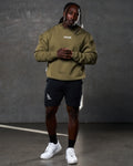 Front-facing men’s green crewneck featuring ribbed cuffs, a centered Lyftlyfe logo, and ultra-plush fleece for comfort.