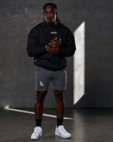 Men’s oversized black crewneck sweater with ultra-plush fleece fabric, 3D rubberized Lyftlyfe logo on the chest, and ribbed cuffs and hem.